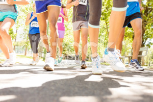 Fundraising stock-photo-44651088-low-section-of-marathon-runners-competing-at-park